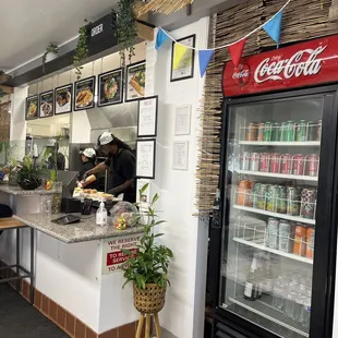 a man preparing food in a restaurant