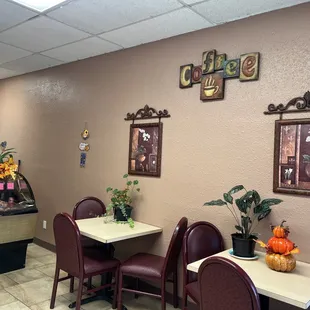 a restaurant with tables and chairs