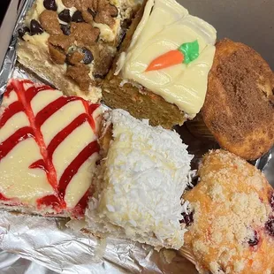 Chocolate chip cheesecake bar, Carrot Cake, Coffee Cake muffin, strawberry cheesecake, coconut cake and lemon raspberry muffin