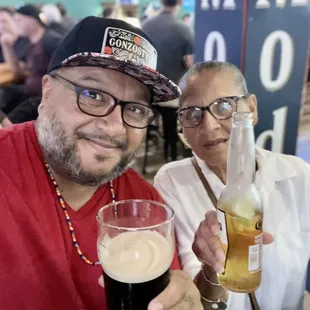 a man holding a beer