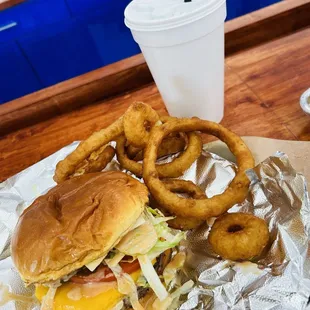 Burger: That Long Way Side: Onion Rings  Drink: Regular Fountain Drink