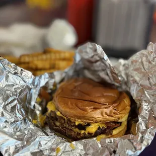 Double cheese turkey burger w Cajun seasoning fries