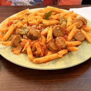 Sausage Peppers and onions over penne.