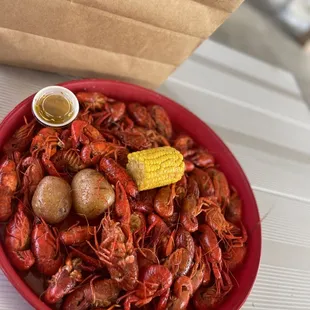 a bowl of craws and potatoes