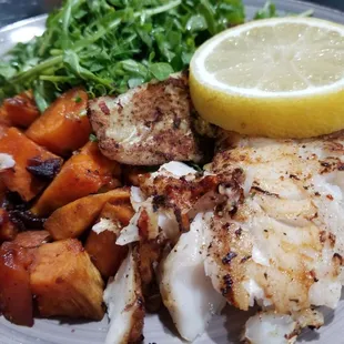 Lemon-butter pan fried Cod with cranberry sweet potatoes  and arugula parsley salad.