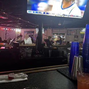 Sitting at the bar during Karaoke