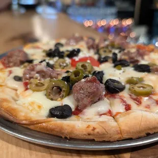 Personal size and large pizzas, dough made fresh in house daily