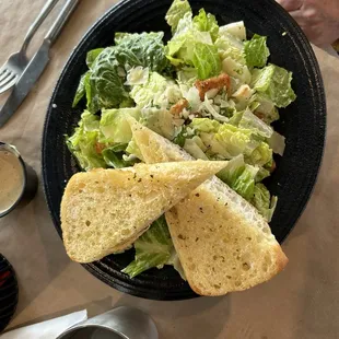 Caesar salad with fresh garlic toast.