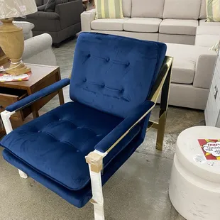 My client will love this beautiful velvet blue chair!