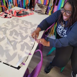 Our Student having a blast at our spring Fringe Skirt Sip and Sew Class!