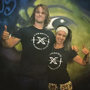 Coach Kyle and Paula repping our new Lawrence Barbell Club T-shirts