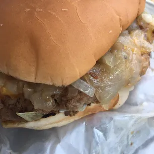 Turkey burger with cheese and grilled onions