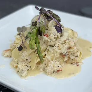 Dungneness Crab Pappardelle with herb butter cream and grilled asparagus