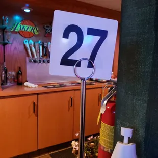 Waiting on a to-go cheese pizza.