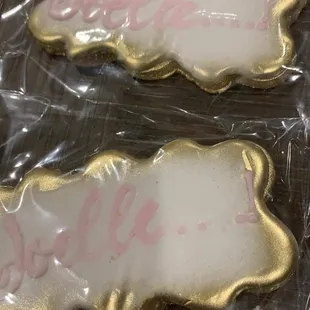 two decorated cookies