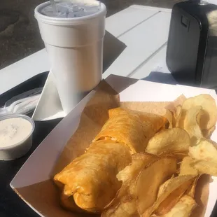Buffalo chicken wrap, chips and dip, fountain drink.