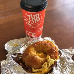 Bacon, egg and cheese bagel and coffee