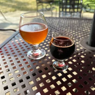 a glass of beer on a table