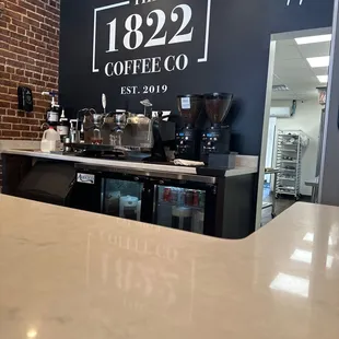 the counter and coffee machine