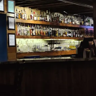 Behind the bar.