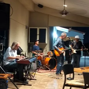 a group of people playing instruments