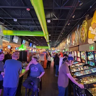 customers playing pinball