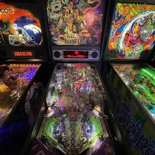 a row of pinball machines
