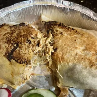 This was supposed to be a shrimp burrito with a side of sour cream.