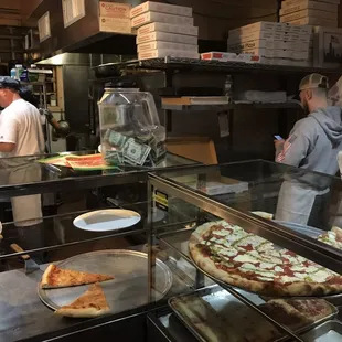 pizzas in a restaurant kitchen
