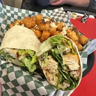 The gladiator sandwich as a wrap with the 303 tots