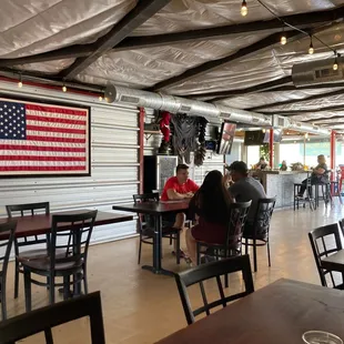 a large american flag on the wall