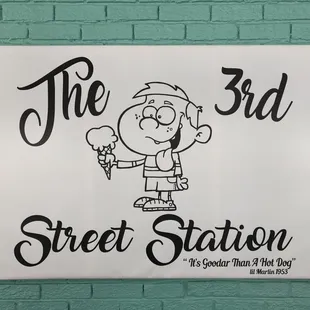 a sign for the third street station
