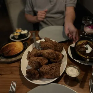 whole smoked fried chicken and warm baked cornbread and twice baked potatoes