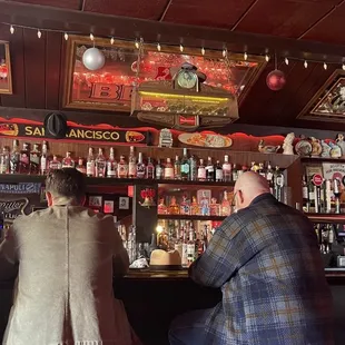 a group of people at the bar