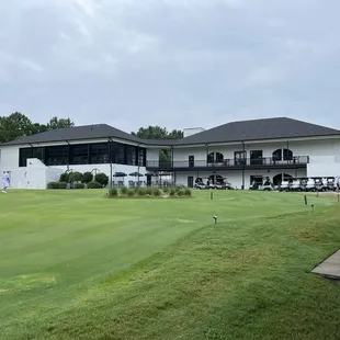 practice putting green and the club house