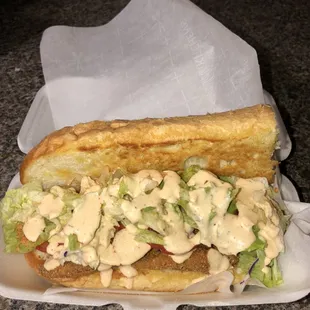 Catfish Po Boy-Served on genuine New Orleans Gambino French bread, with tomatoes, lettuce and our house remoulade sauce.