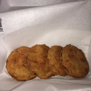Fried Green Tomatoes-fried green tomatoes served with honey mustard sauce.
