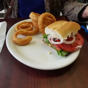 The 50's Sandwich: tasty roast beef, lettuce, tomato, onion and mayo on a hoagie bun. Hot, crispy battered onion rings were awesome.