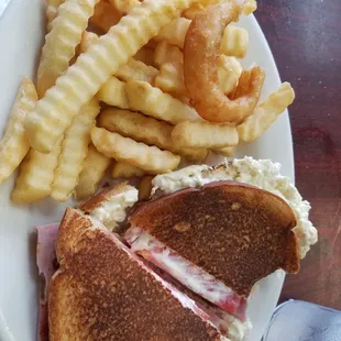 Awesome toasted homemade egg salad, baked ham and tomato sandwich. Not on the menu but they'll make it special for you.