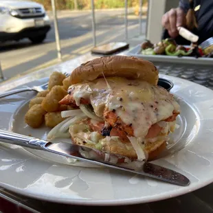 Salmon burger with tots!