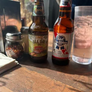 a beer and a glass of water