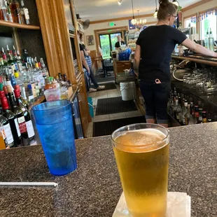 a pint of beer on the bar
