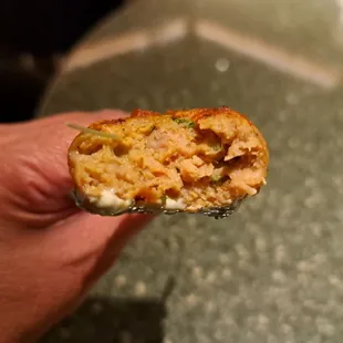 Inside Chicken Tandoori Lollipop, a ground chicken meatball.