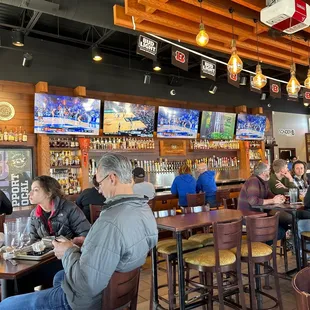 people eating and drinking