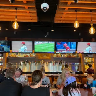 people sitting at the bar