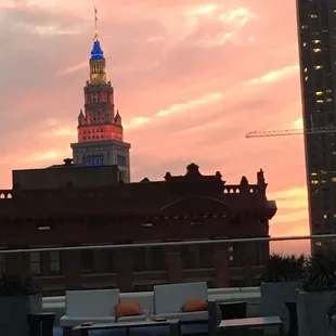 a view of a clock tower at sunset