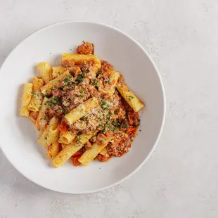 a plate of pasta with meat sauce