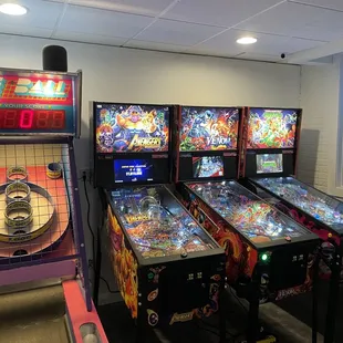 a row of pinball machines