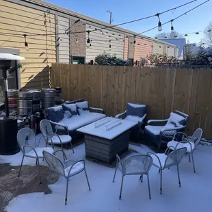 a snow covered patio