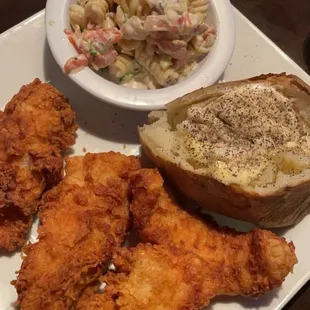 Catfish, pasta salad, and baked potato